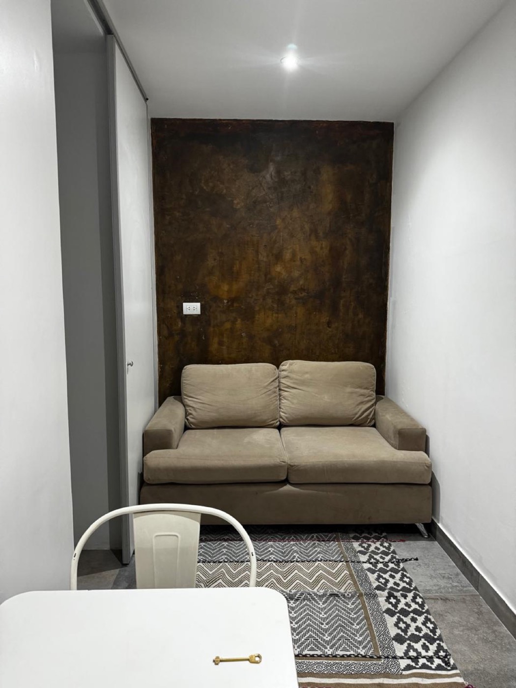O apartamento com pátio — Cantinho de estar